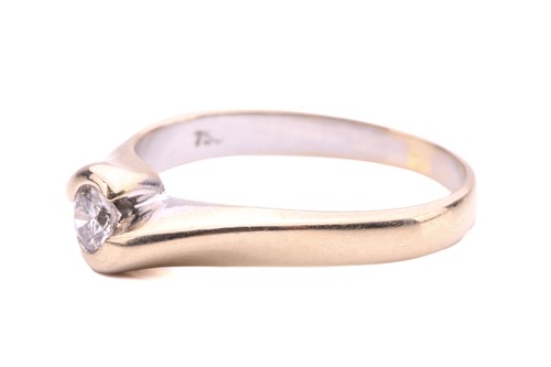 Lot 72 - A diamond solitaire cross-over ring, set with...