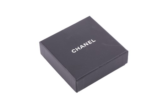 Lot 118 - Chanel - an interlocking CC logo brooch with...