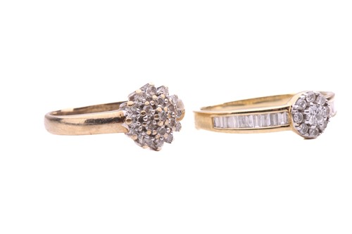 Lot 21 - Two diamond cluster rings; the first in the...