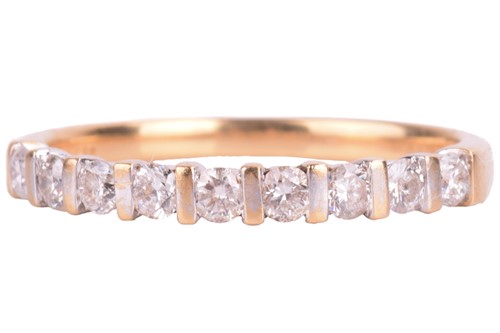 Lot 189 - A diamond half eternity ring in 18ct gold, bar-...