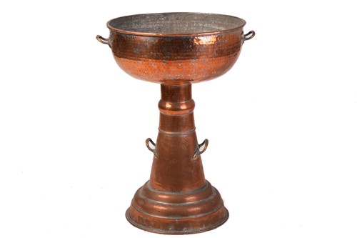 Lot 192 - A large floor-standing copper jardiniere, hand-...