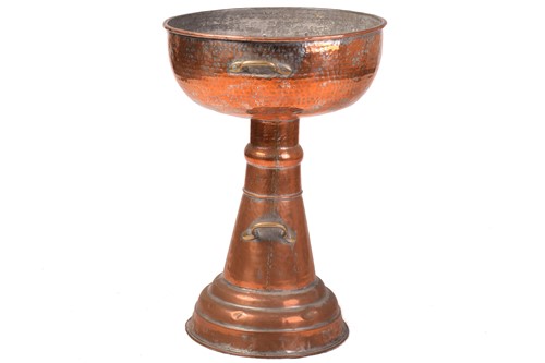 Lot 192 - A large floor-standing copper jardiniere, hand-...