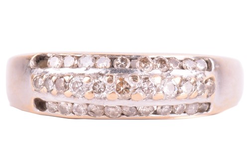 Lot 54 - A three-row diamond dress ring, centred with a...