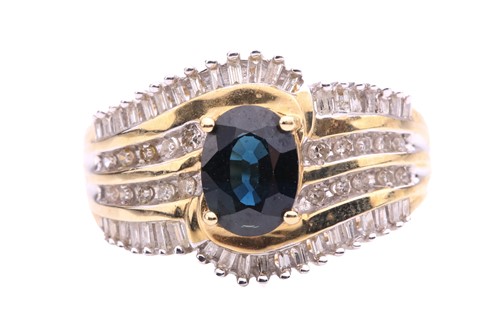 Lot 164 - A sapphire and diamond dress ring, set with a...