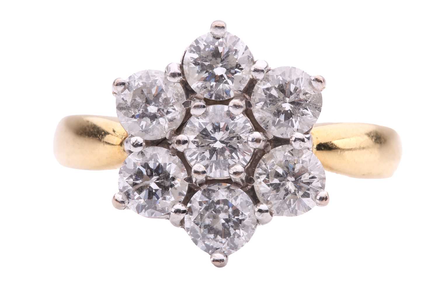 Lot 27 - A diamond cluster ring, set with seven round...