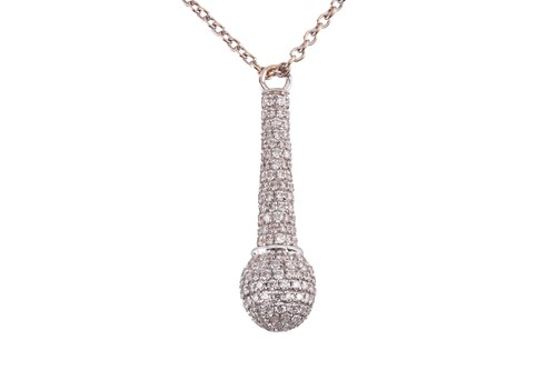 Lot 326 - A diamond set microphone pendant and chain in...