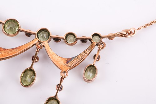 Lot 122 - A late Victorian peridot and seed pearl fringe...