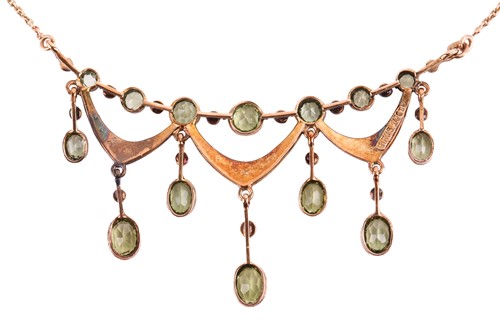 Lot 122 - A late Victorian peridot and seed pearl fringe...