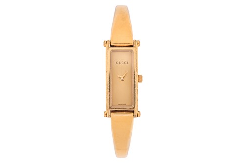 Lot 426 - A Gucci gold-plated stainless steel lady's...