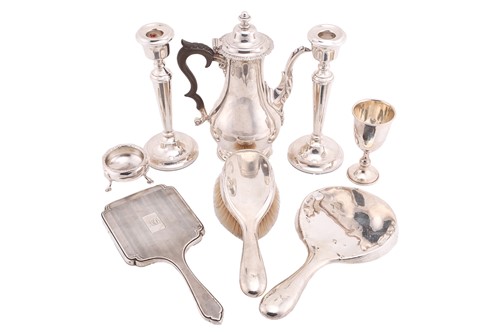 Lot 579 - A collection of silver items comprising a late...