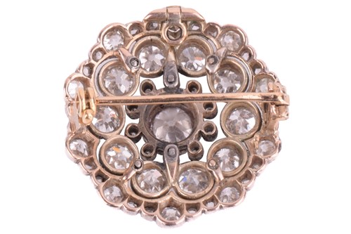 Lot 246 - A Victorian diamond brooch, set to the centre...