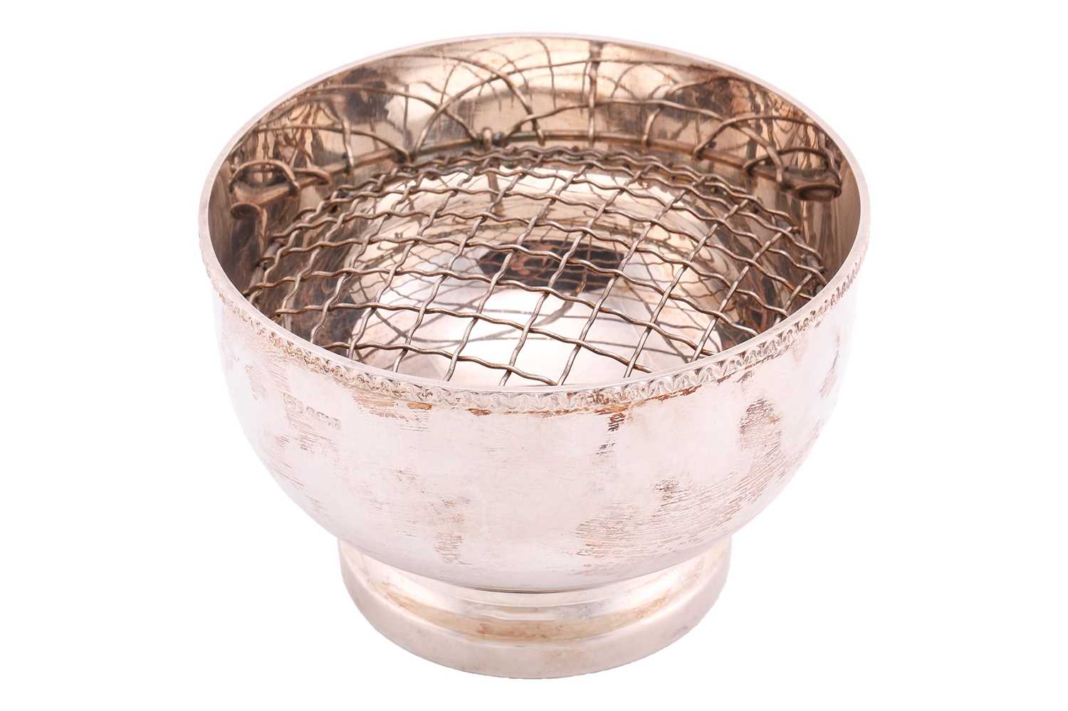Lot 511 - A silver rose bowl of circular form with...