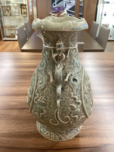 Lot 120 - A Chinese celadon glazed porcelain baluster...