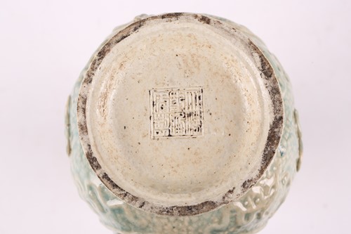 Lot 120 - A Chinese celadon glazed porcelain baluster...