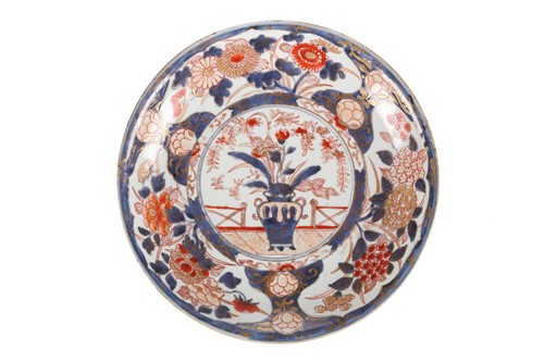 Lot 112 - A Japanese Imari porcelain circular dish, Edo...