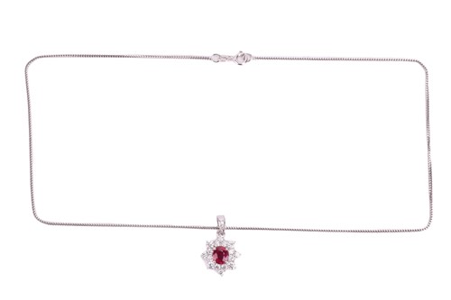 Lot 257 - A ruby and diamond cluster pendant and...