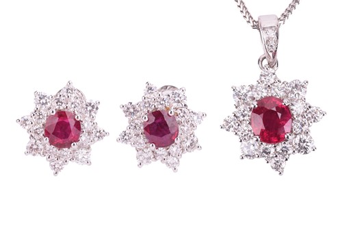 Lot 257 - A ruby and diamond cluster pendant and...