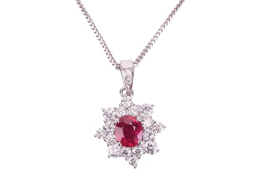 Lot 257 - A ruby and diamond cluster pendant and...