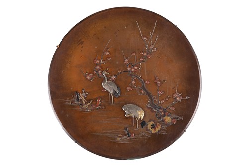 Lot 4 - A matched pair of Japanese bronze circular...