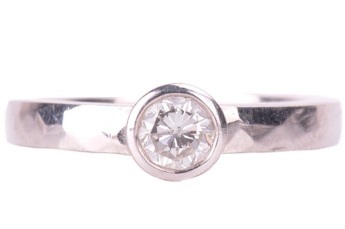 Lot 30 - A diamond solitaire ring, set with a round...