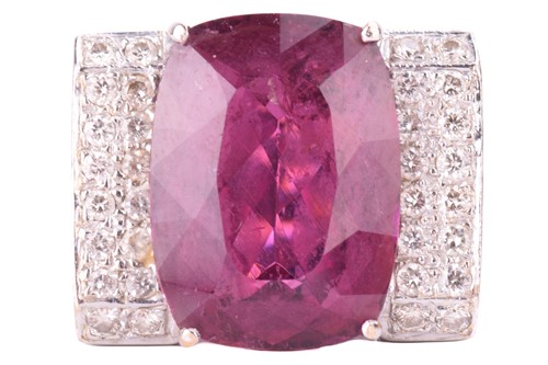Lot 240 - A pink tourmaline and diamond dress ring, set...