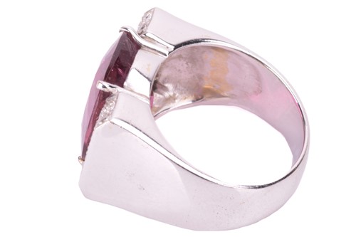 Lot 240 - A pink tourmaline and diamond dress ring, set...