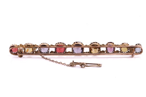 Lot 76 - A multi gem set bar brooch, set with various...