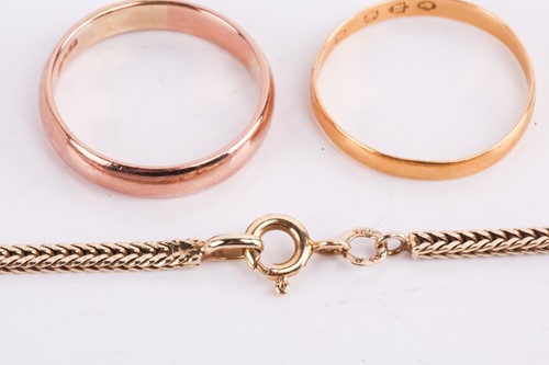 Lot 37 - Two wedding bands and a chain necklace; the...