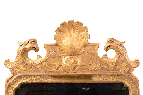 Lot 151 - A George II style giltwood wall mirror, the...