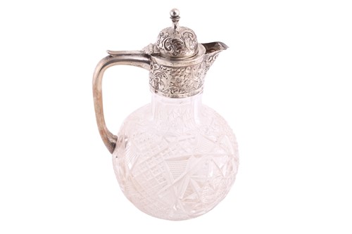 Lot 396 - A Victorian silver mounted claret jug, the...