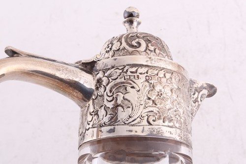 Lot 396 - A Victorian silver mounted claret jug, the...