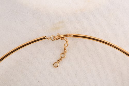Lot 52 - An abstract choker necklace, in a curvilinear...