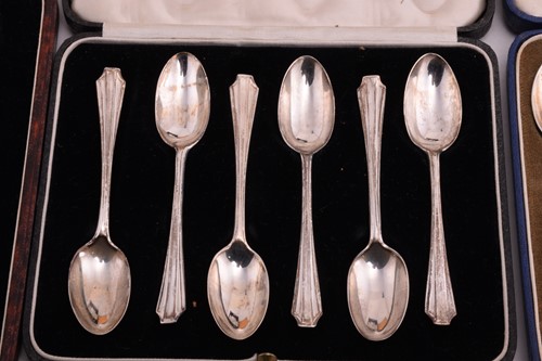 Lot 402 - A set of twelve mother of pearl handled silver...