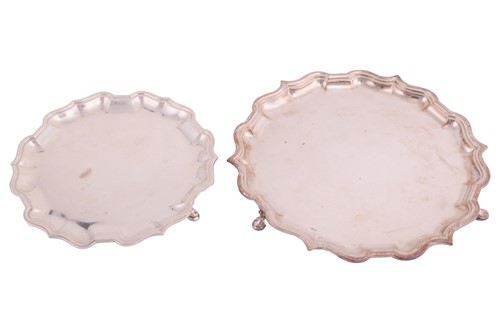 Lot 446 - Two silver salvers each of plain circular form...