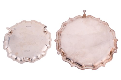 Lot 446 - Two silver salvers each of plain circular form...