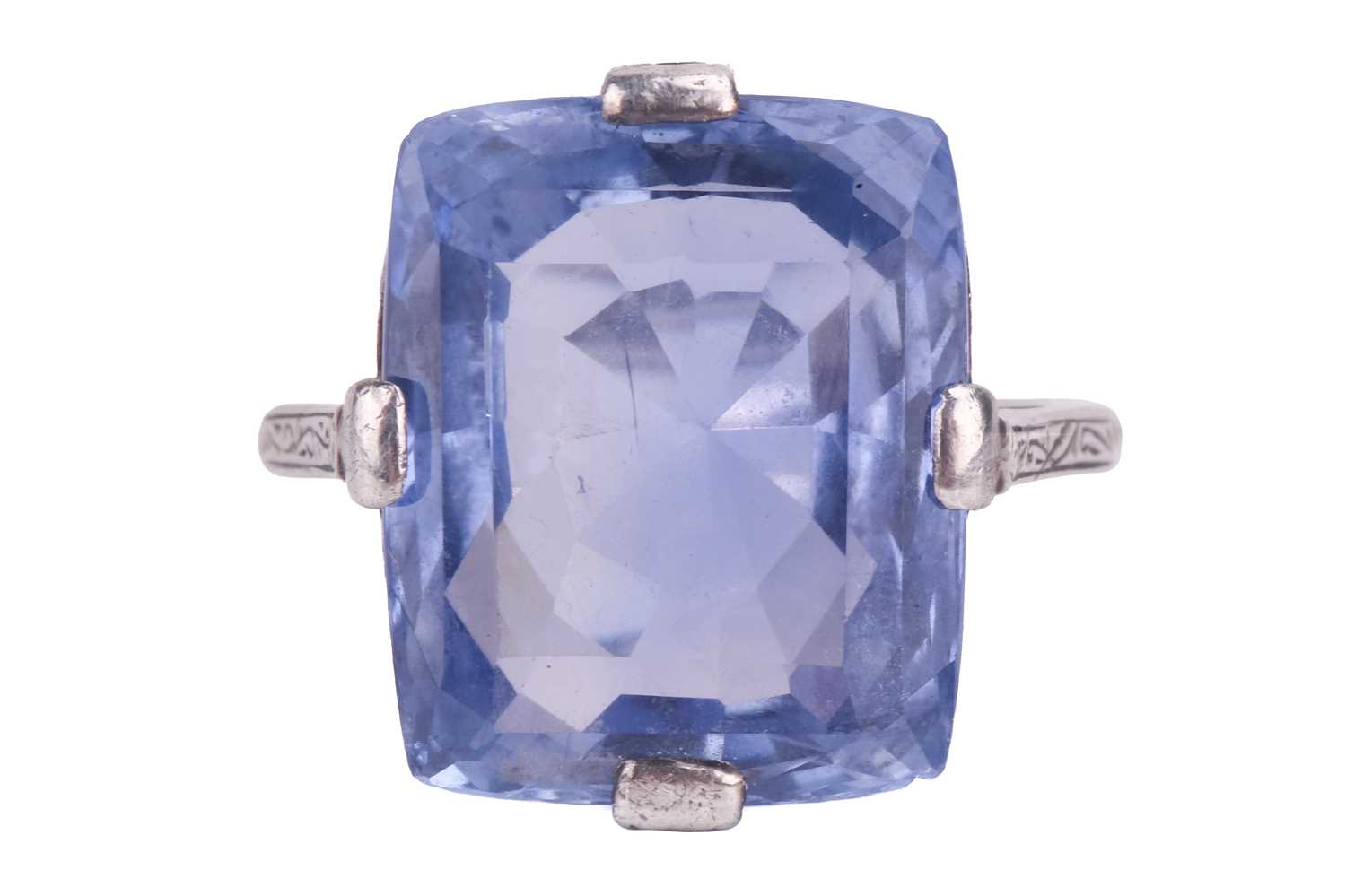 Lot 297 - A Ceylon sapphire single stone ring, set with...