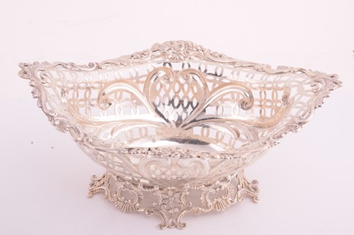 Lot 410 - A Victorian silver basket, by William Comyns &...