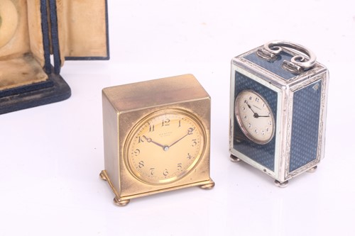 Lot 333 - A Collection of Three Travel Clocks A Longines...