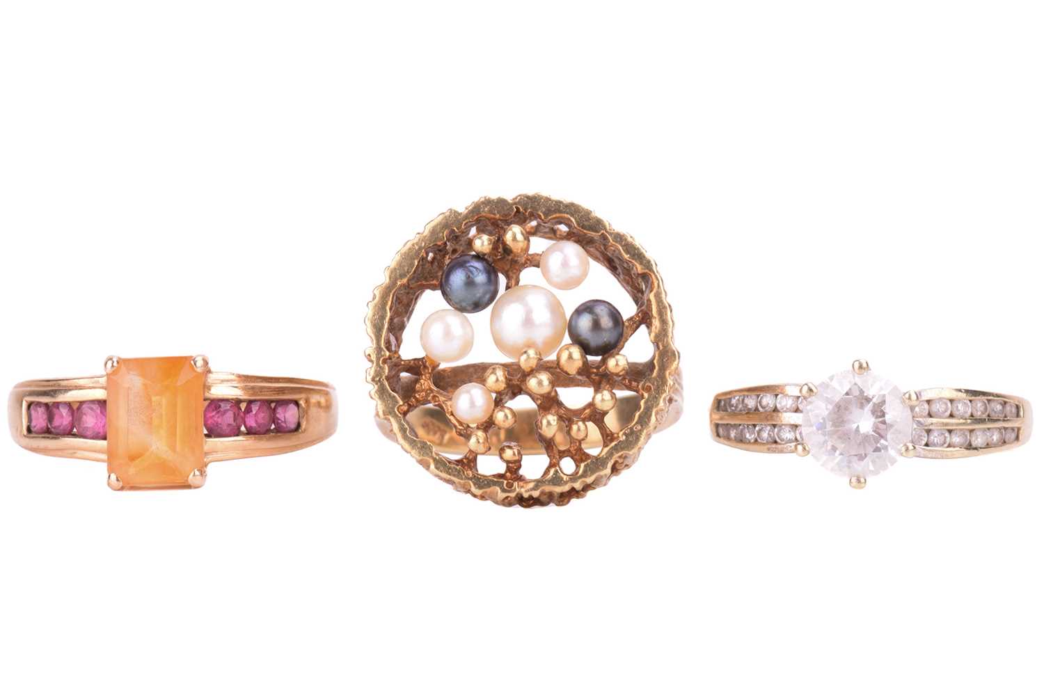 Lot 15 - A collection of three rings, including a...