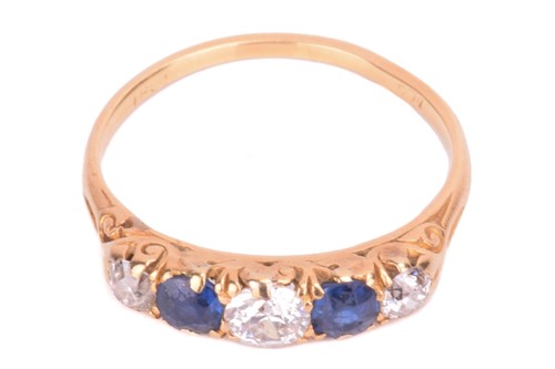 Lot 105 - A sapphire and diamond half hoop ring,...