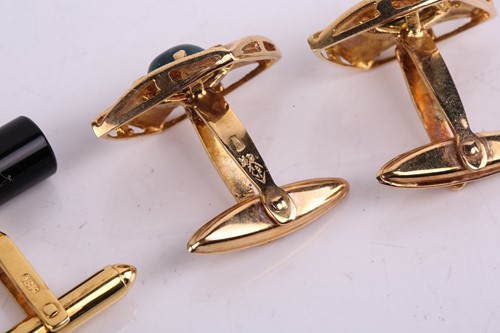 Lot 119 - Two pairs of gem-set cufflinks; the first...