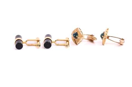 Lot 119 - Two pairs of gem-set cufflinks; the first...