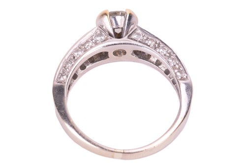 Lot 97 - A diamond solitaire ring, set with a round...
