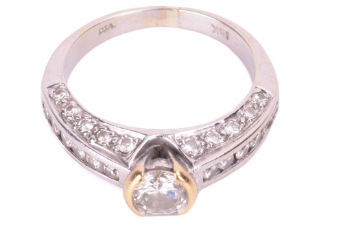 Lot 97 - A diamond solitaire ring, set with a round...