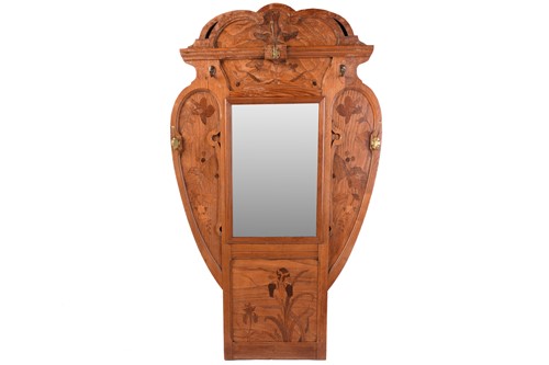 Lot 132 - A French oak and marquetry hall mirror with...