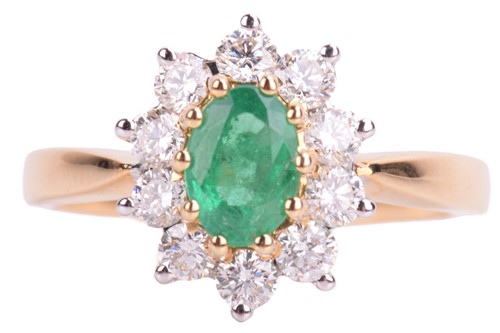 Lot 68 - An emerald and diamond cluster ring in 18ct bi-...