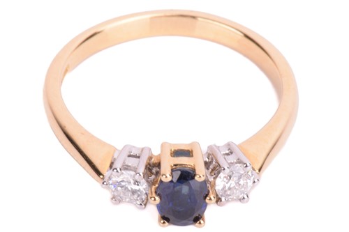 Lot 39 - A sapphire and diamond trilogy ring in 18ct bi-...