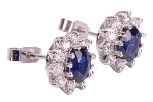 Lot 78 - A pair of sapphire and diamond cluster...