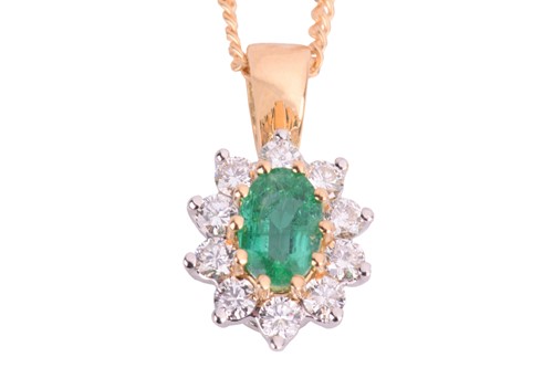 Lot 67 - An emerald and diamond cluster pendant on...