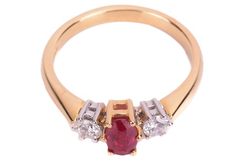 Lot 24 - A ruby and diamond trilogy ring in 18ct yellow...